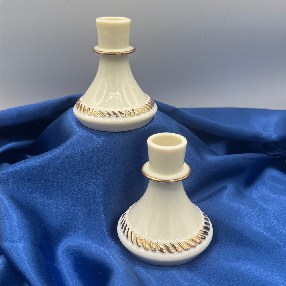 Wheatonware custard glass candlestick holders featuring 24K gold trim.